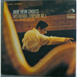 Previn André conducts...